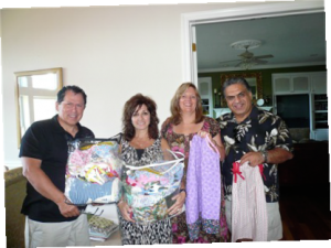 Walter and Nina receiving newly made dress from Rae & Jason Zarghami of “Made With Lots Of Love” for orphans in Ukraine