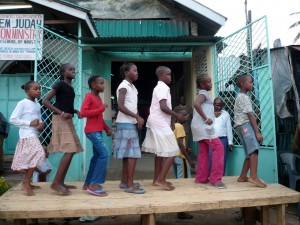Children sing/dance at open air crusade in Mombasa, Kenya